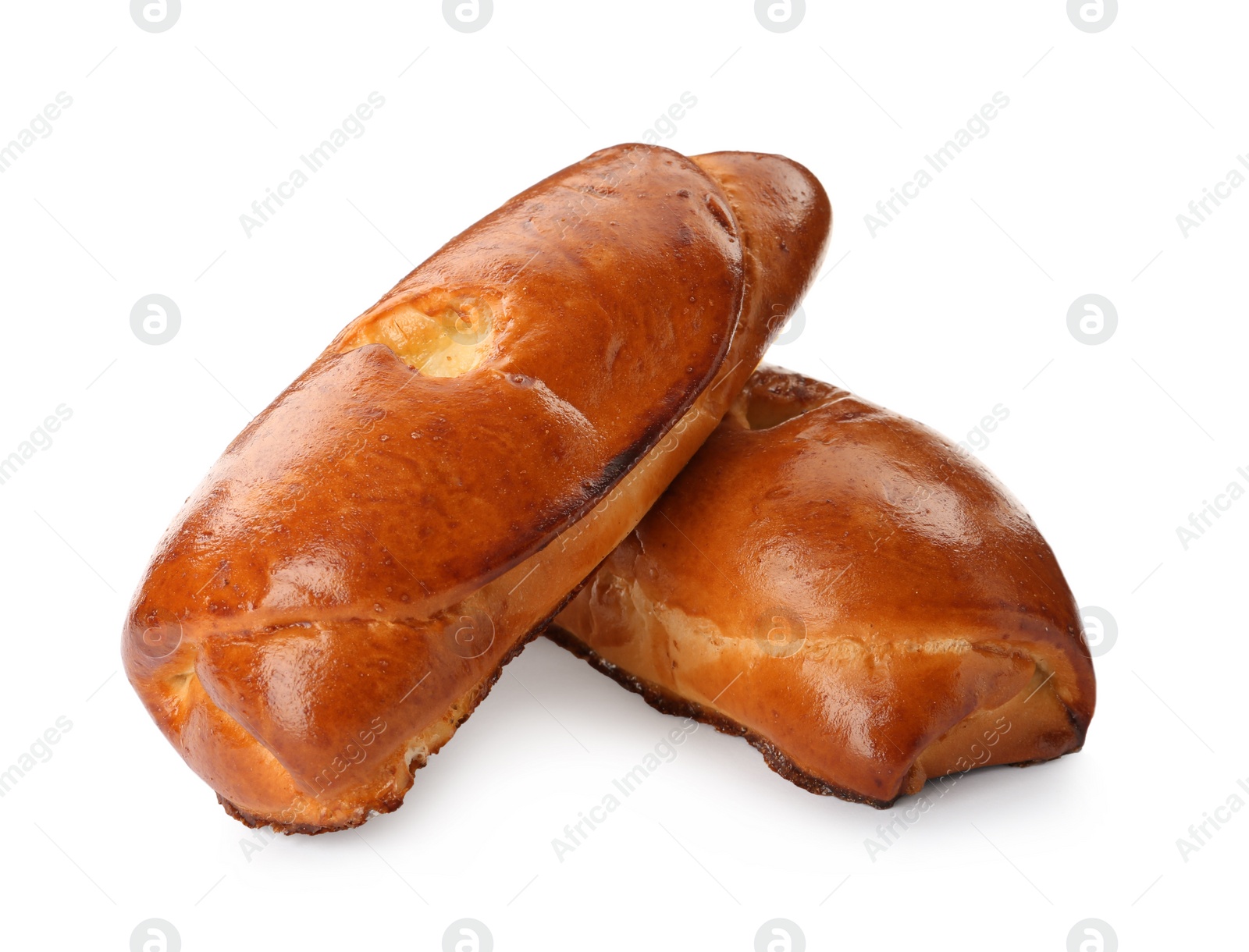 Photo of Two delicious baked patties with filling on white background