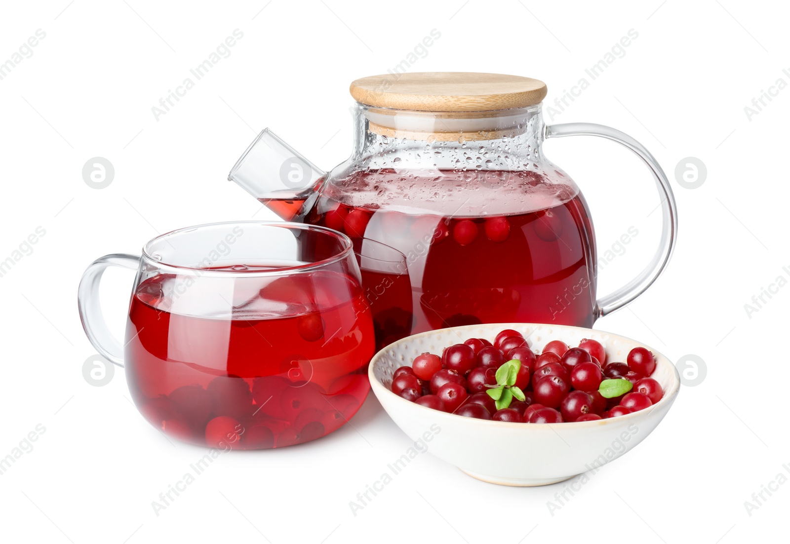 Photo of Tasty hot cranberry tea with fresh berries isolated on white