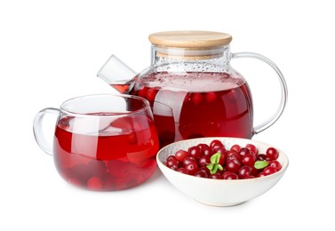 Photo of Tasty hot cranberry tea with fresh berries isolated on white