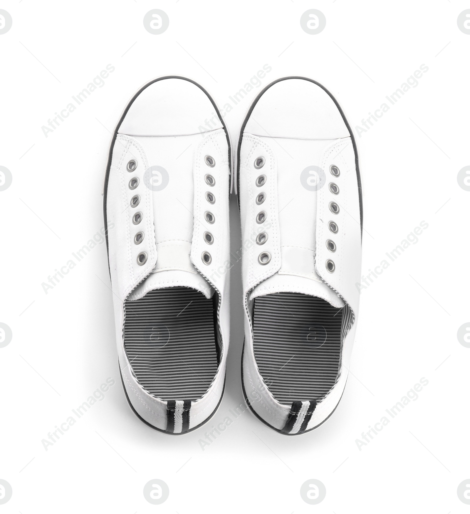 Photo of Pair of stylish sneakers on white background, top view