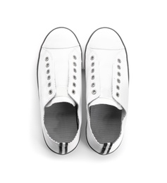 Pair of stylish sneakers on white background, top view