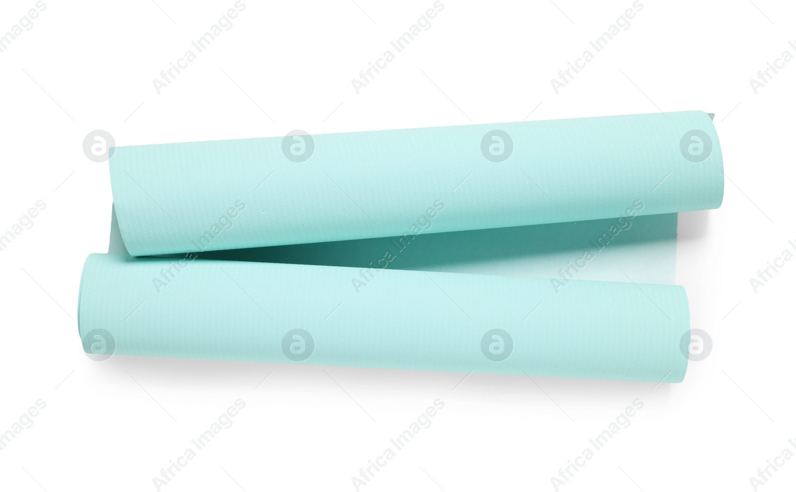 Photo of One light turquoise wallpaper roll isolated on white, top view