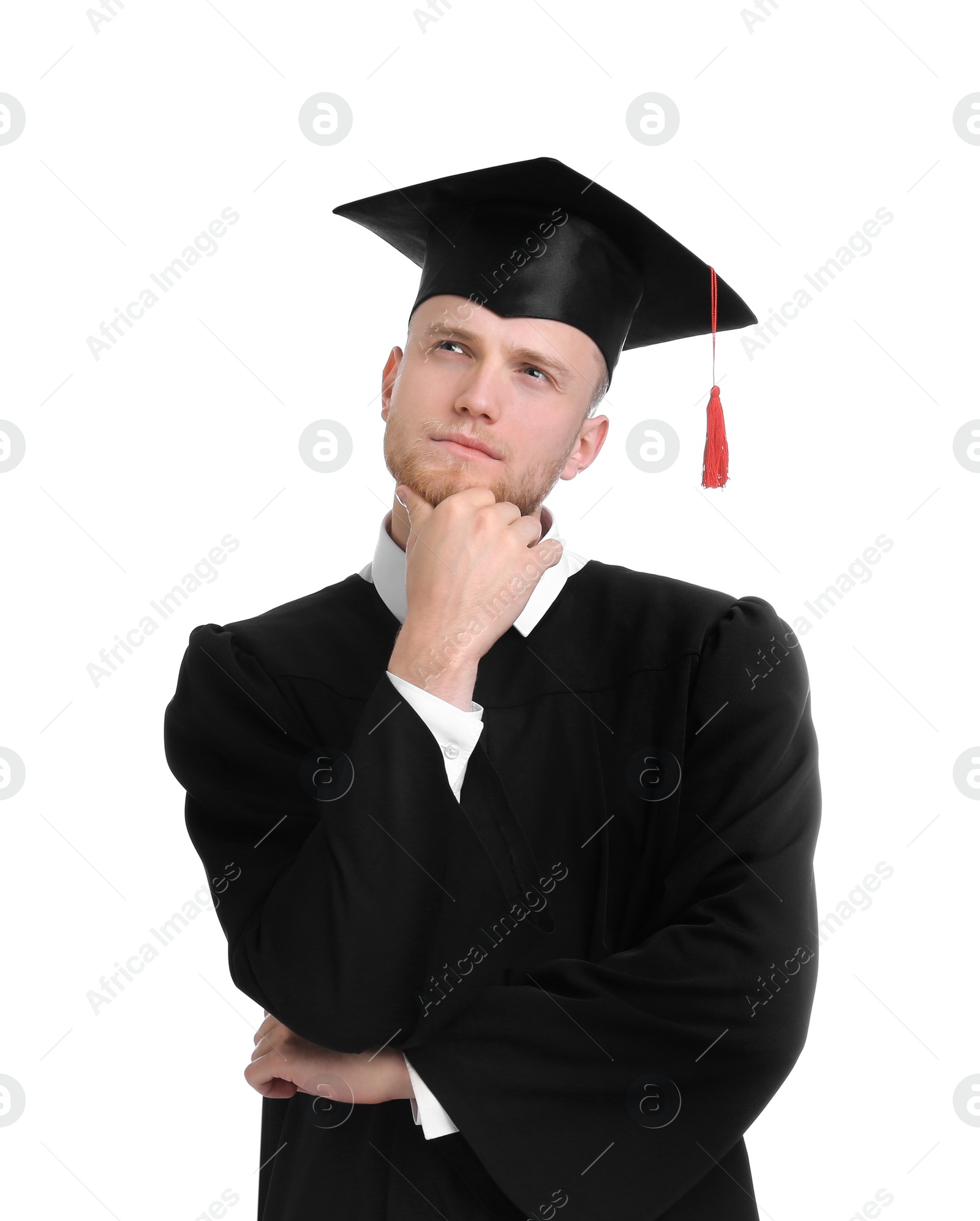 Photo of Thoughtful student wearing graduation hat on white background