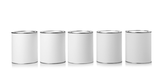 Photo of Paint cans on white background. Mockup for design