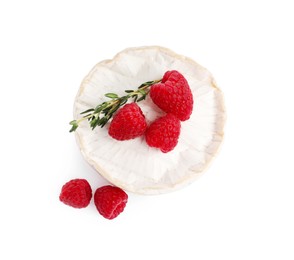 Photo of Brie cheese served with raspberries isolated on white, top view