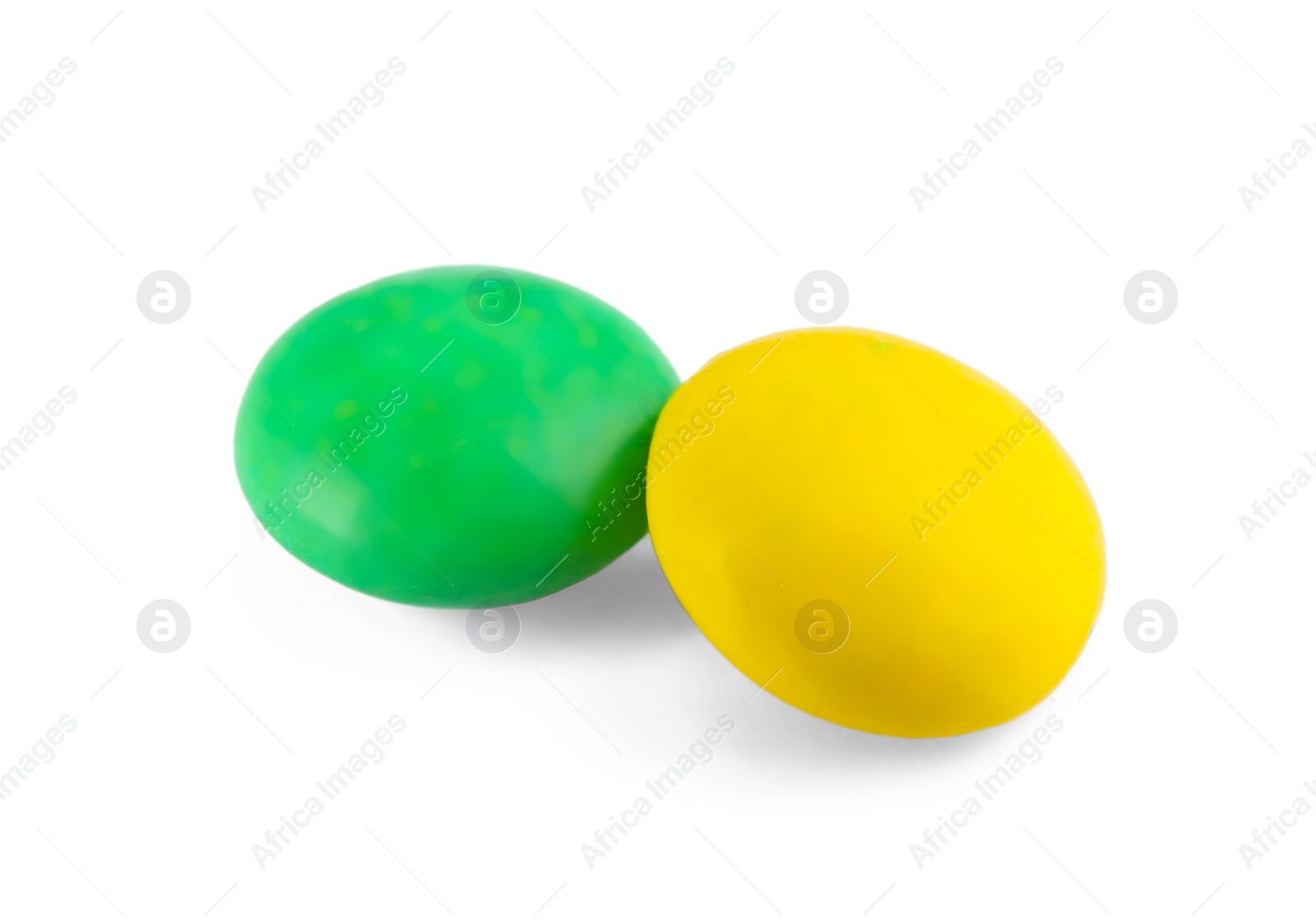 Photo of Small colorful chocolate candies on white background