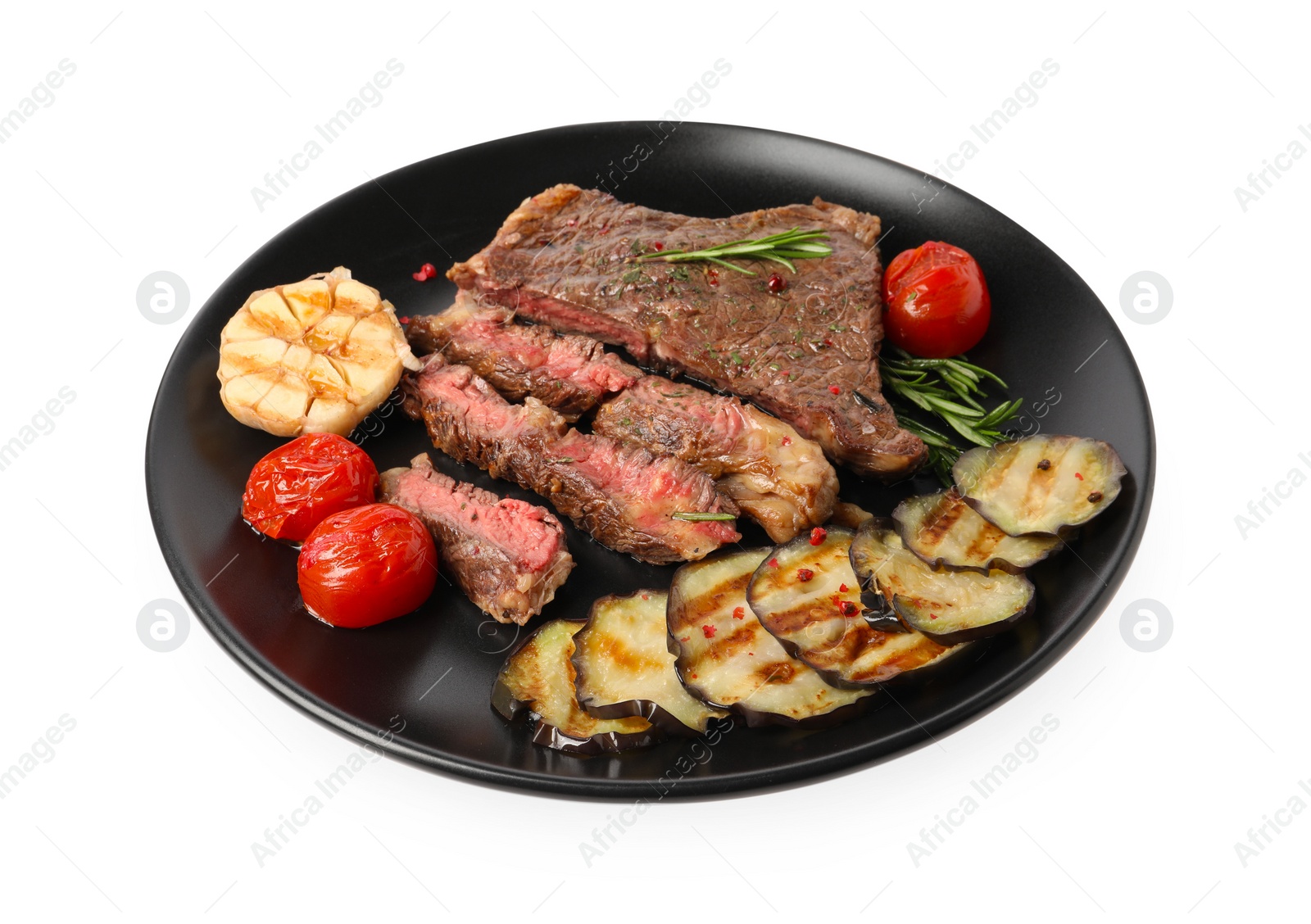 Photo of Delicious grilled beef steak with vegetables and spices isolated on white