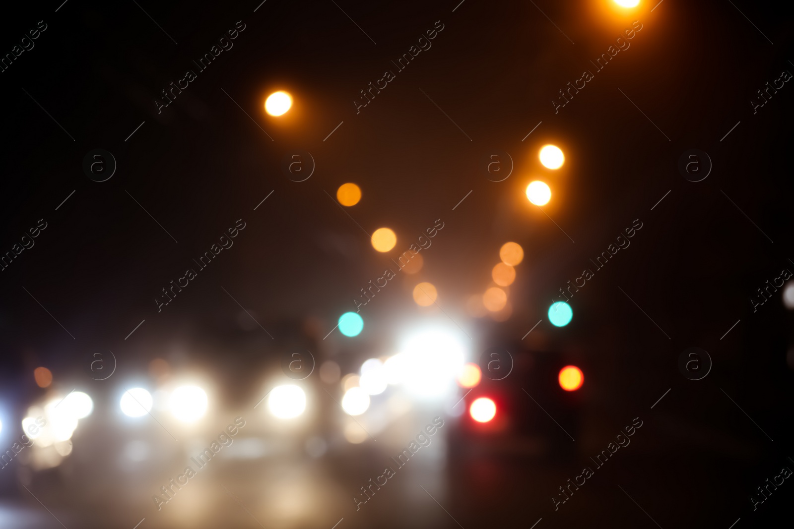 Photo of Blurred view of night city. Bokeh effect