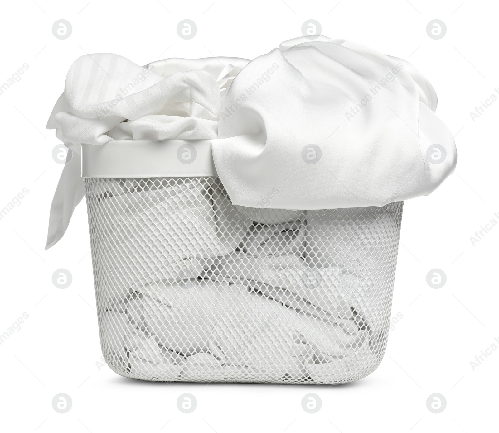 Photo of Laundry basket with clean clothes isolated on white
