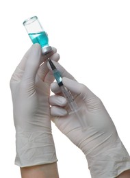 Photo of Doctor filling syringe with medicine from vial on white background, closeup