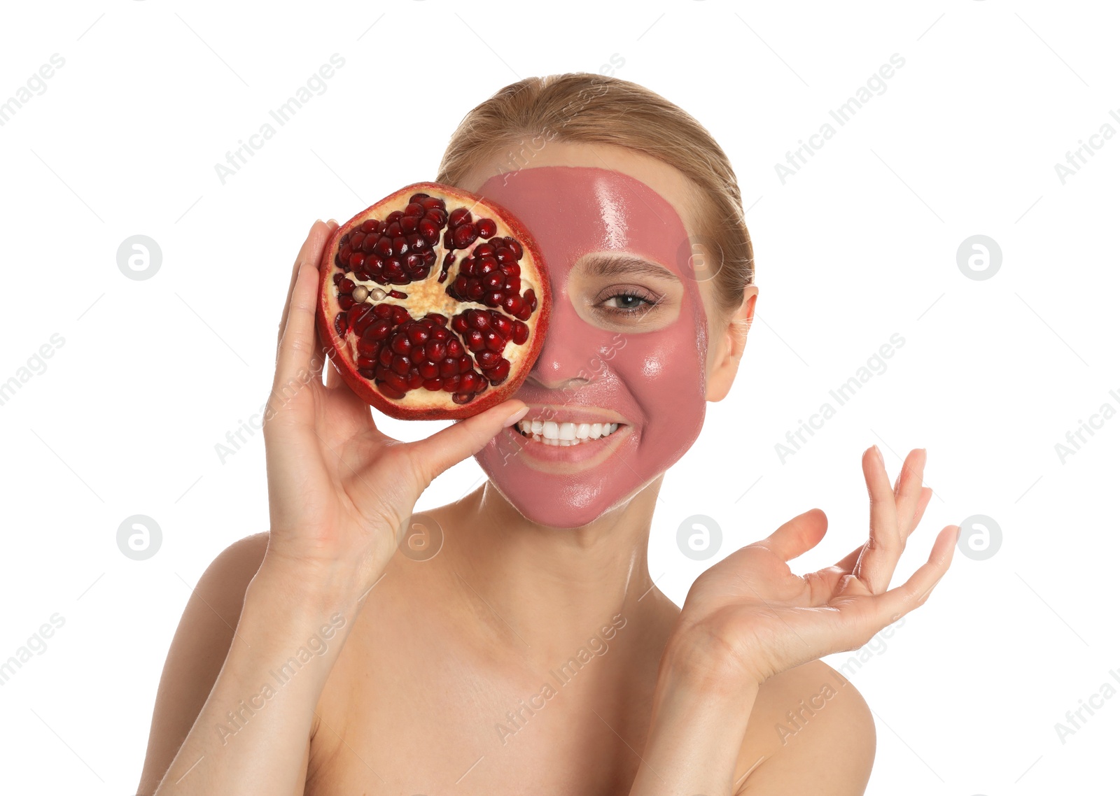 Photo of Young woman with pomegranate face mask and fresh fruit on white background