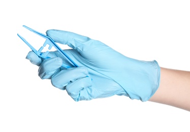 Photo of Doctor in medical glove holding disposable forceps on white background