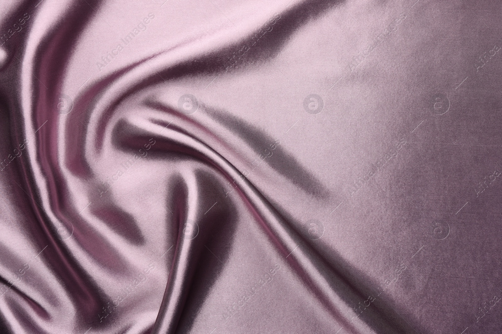 Photo of Texture of beautiful silk fabric as background, closeup