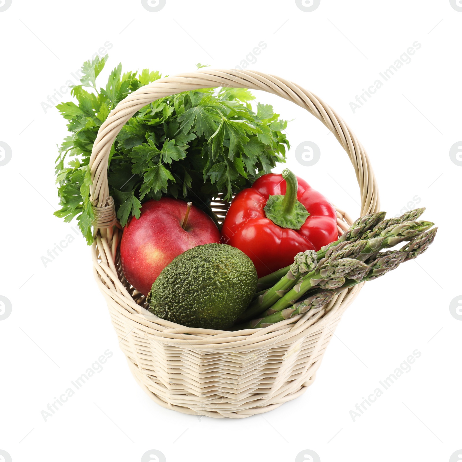 Photo of Healthy food. Different fresh products in wicker basket isolated on white