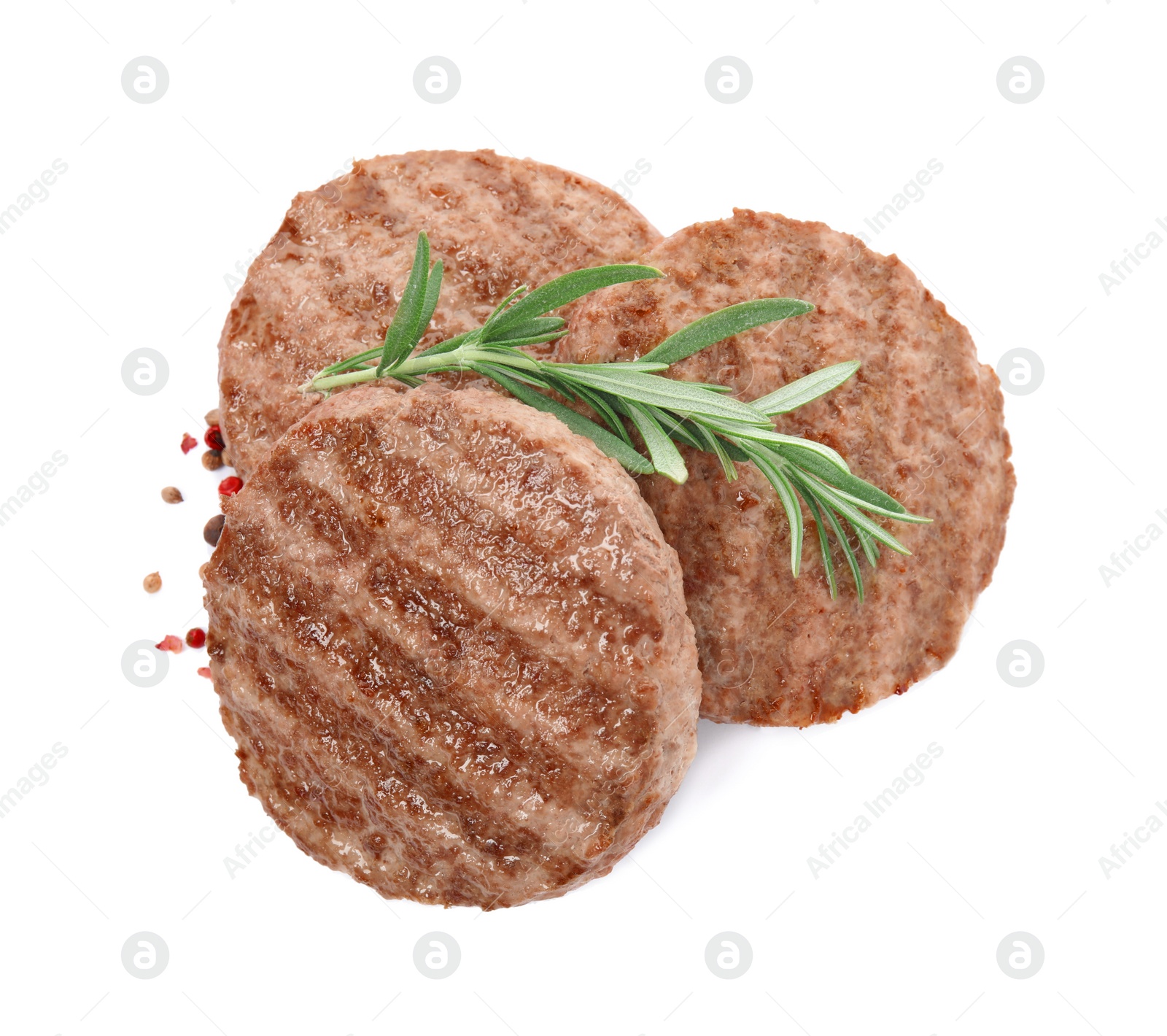 Photo of Tasty grilled hamburger patties with seasonings on white background