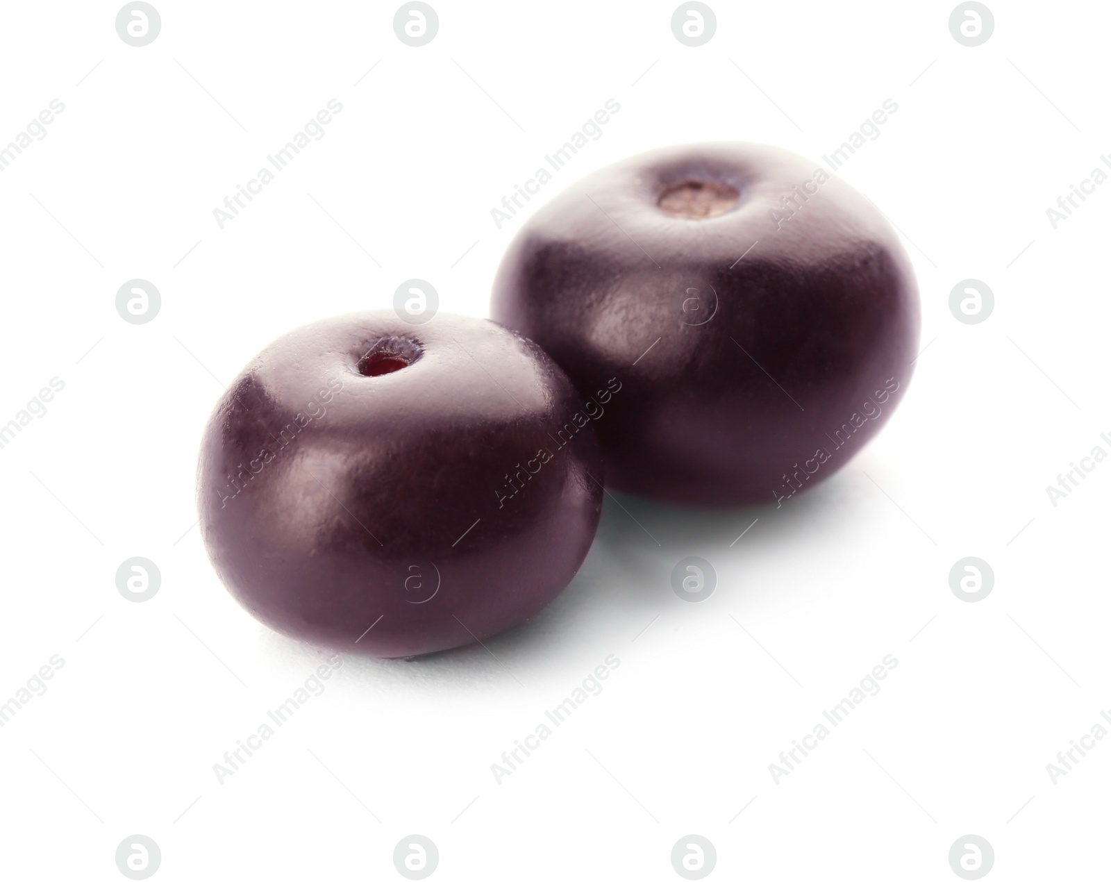 Photo of Fresh ripe acai berries isolated on white