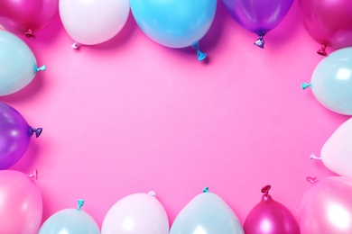 Frame made of balloons on color background, top view with space for text