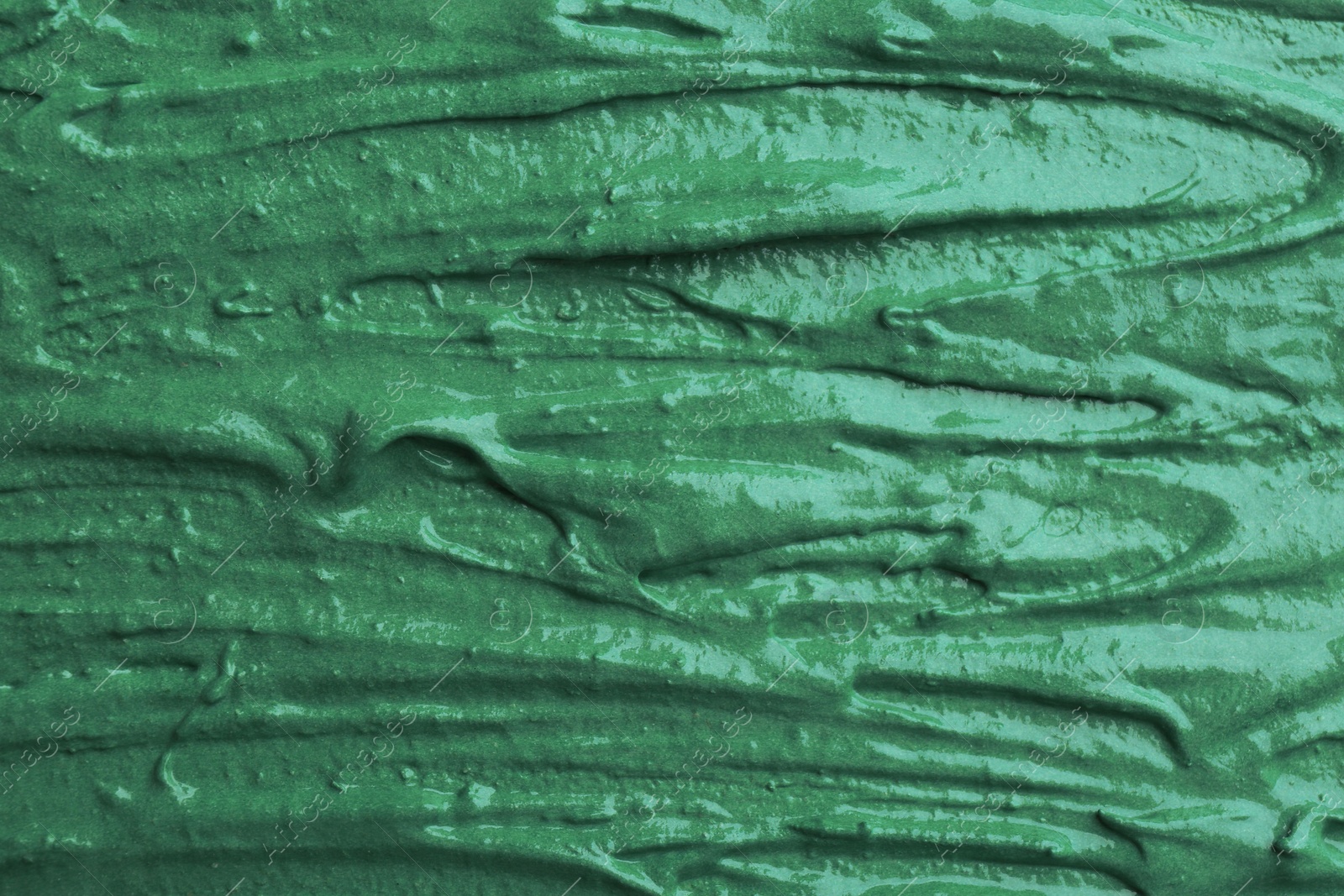 Photo of Natural spirulina facial mask as background, closeup