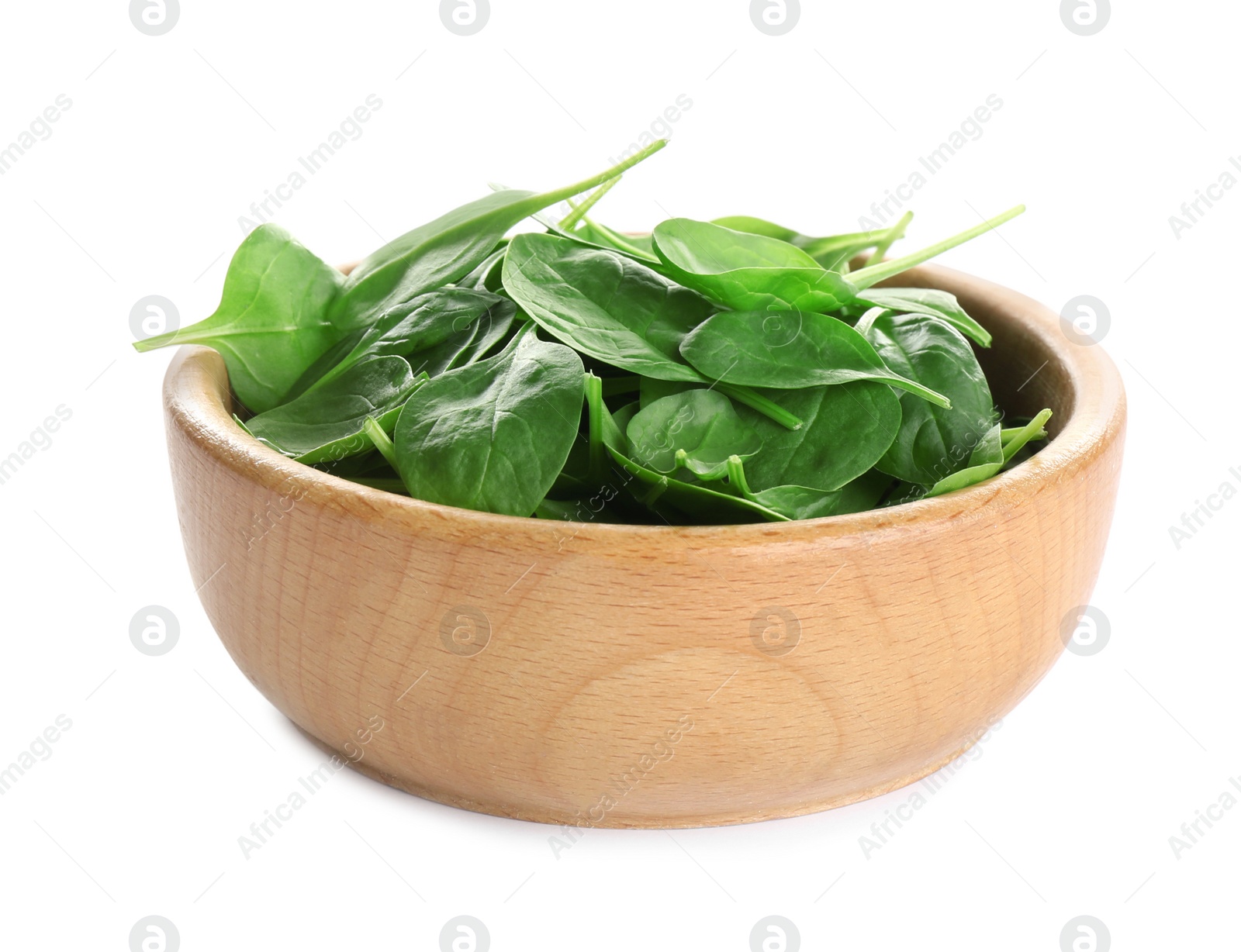 Photo of Wooden bowl of fresh green healthy baby spinach on white background