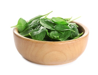 Photo of Wooden bowl of fresh green healthy baby spinach on white background