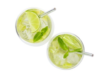 Glasses of refreshing drink with lime and mint isolated on white, top view