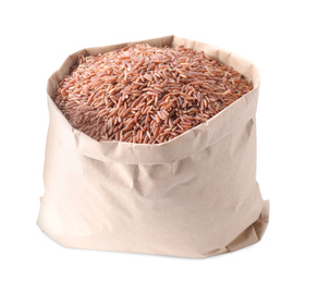 Photo of Brown rice in paper bag isolated on white