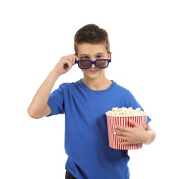 Photo of Boy with 3D glasses and popcorn during cinema show on white background
