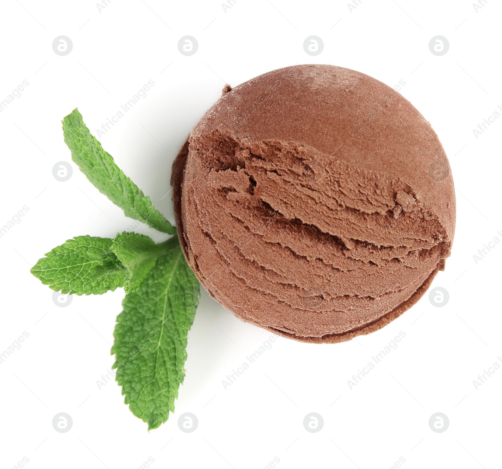 Photo of Scoop of chocolate ice cream and mint isolated on white, top view