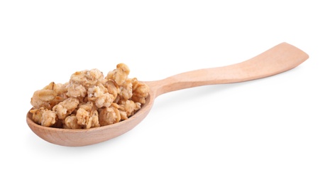 Image of Tasty crispy granola in wooden spoon on white background