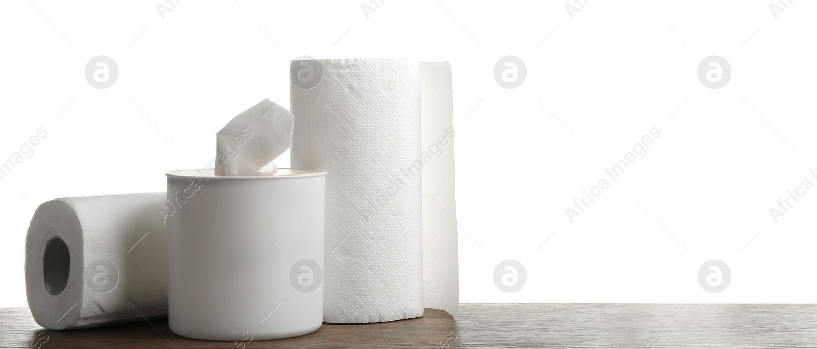 Photo of Different clean paper tissues on wooden table