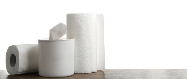 Photo of Different clean paper tissues on wooden table