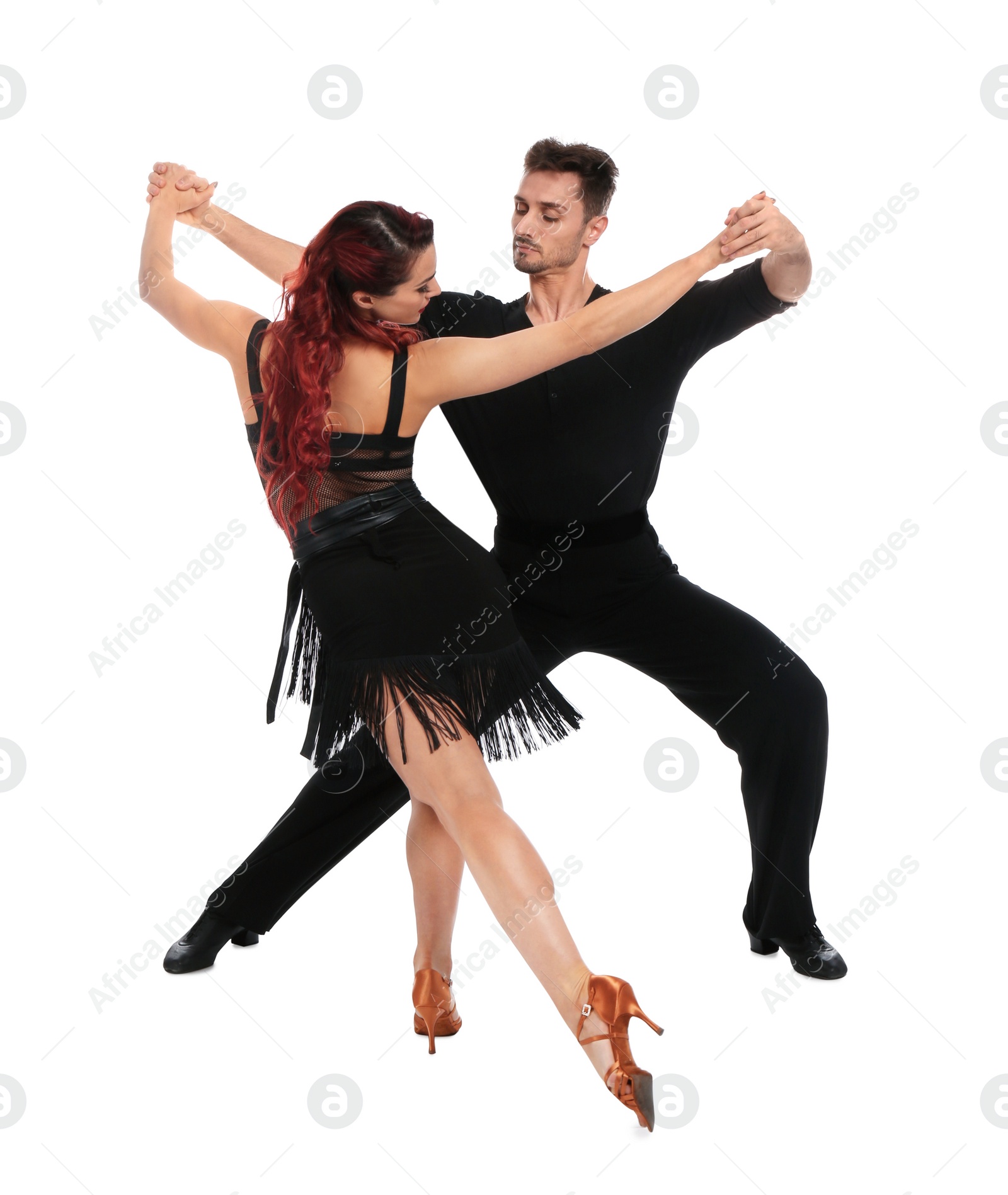 Photo of Passionate young couple dancing on white background