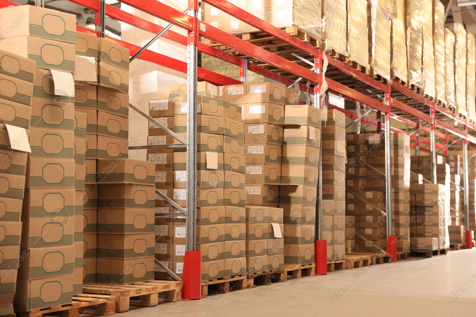 Image of Warehouse with lots of boxes on racks. Wholesale business