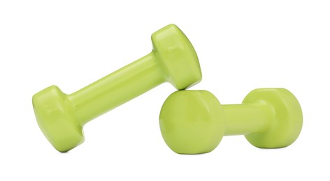 Photo of Light green dumbbells isolated on white. Sports equipment