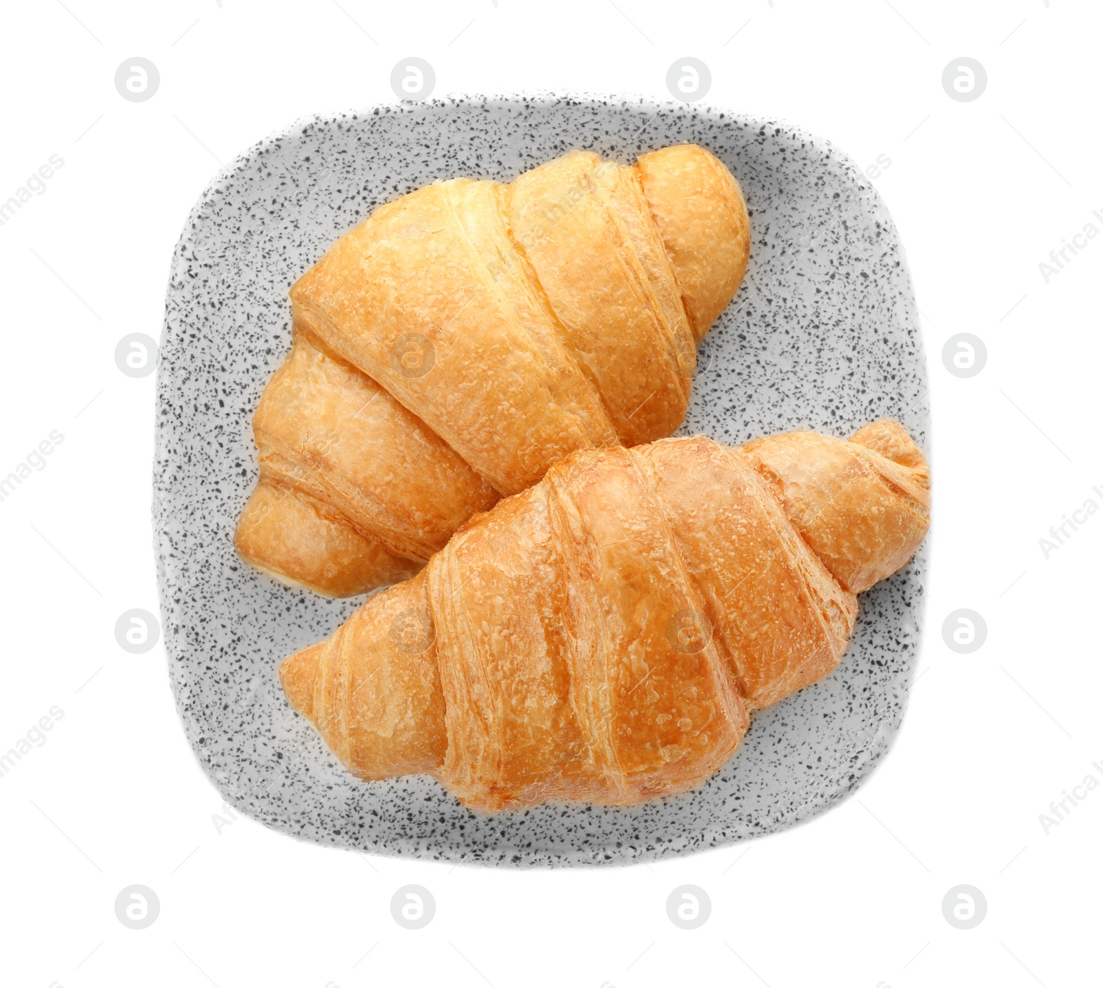 Photo of Plate with tasty croissant on white background, top view