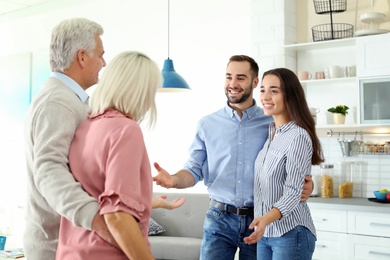 Photo of Happy family at home. Reunion of generations