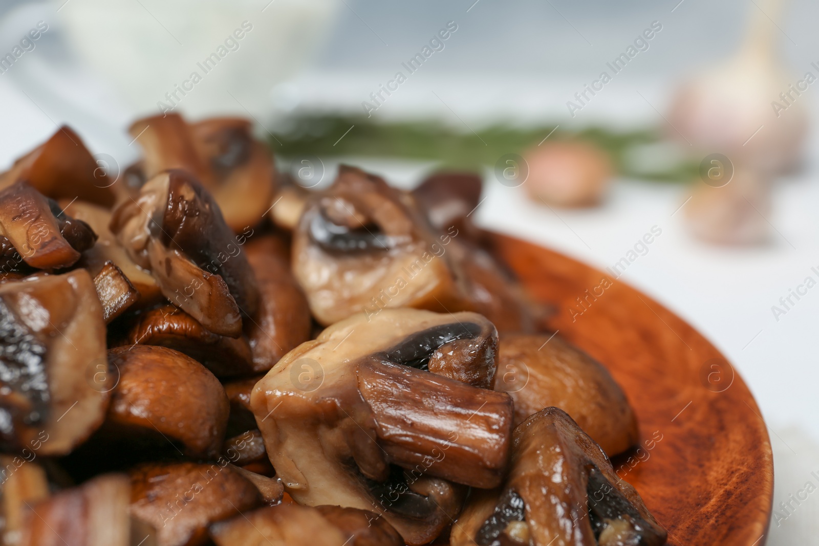 Photo of Plate of tasty fried mushrooms, closeup view