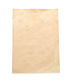 Photo of Sheet of old parchment paper isolated on white, top view. Space for design