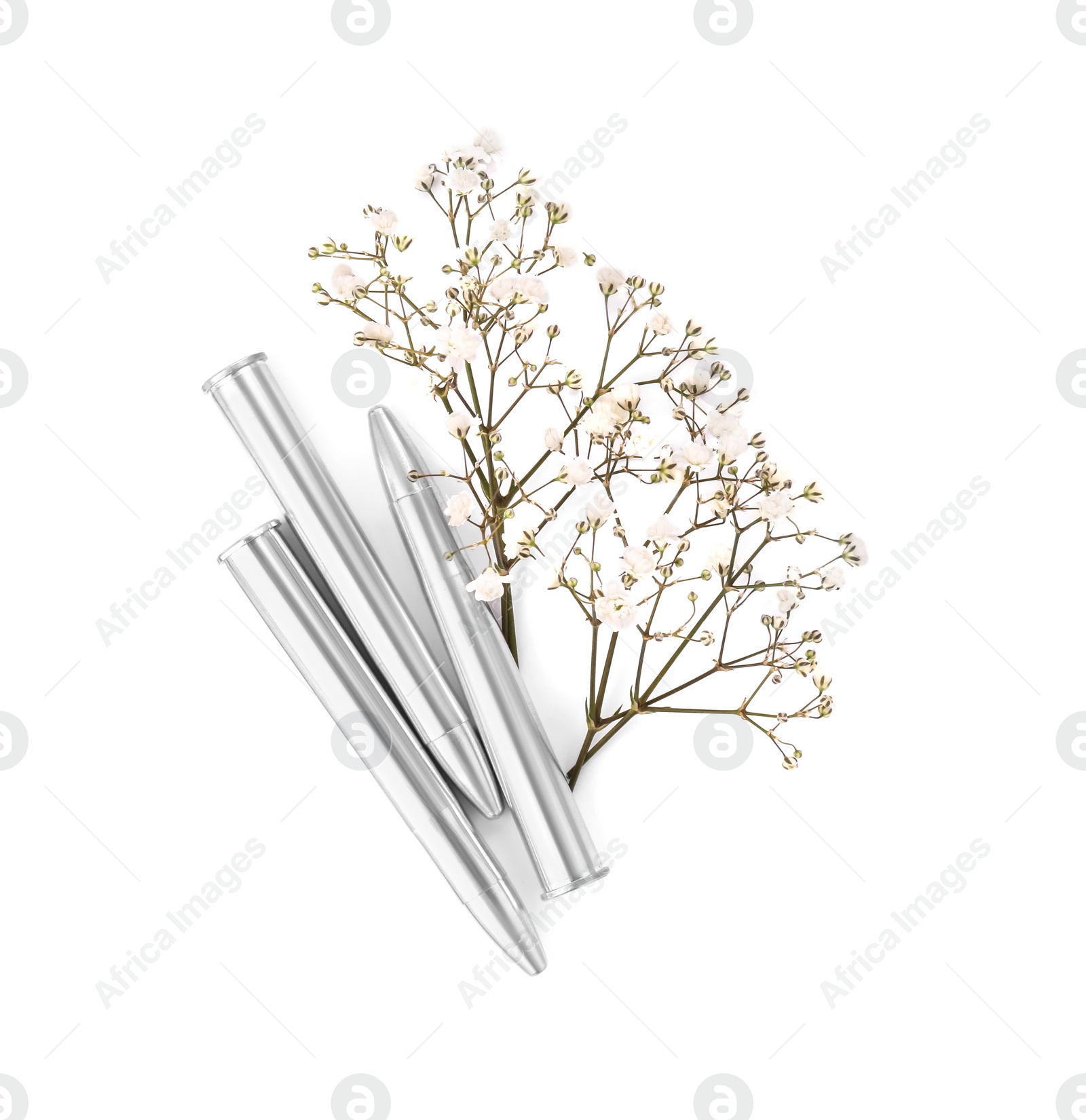 Photo of Bullets and beautiful flowers isolated on white, top view