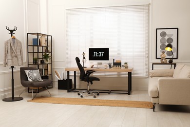 Home office interior with comfortable workplace near window