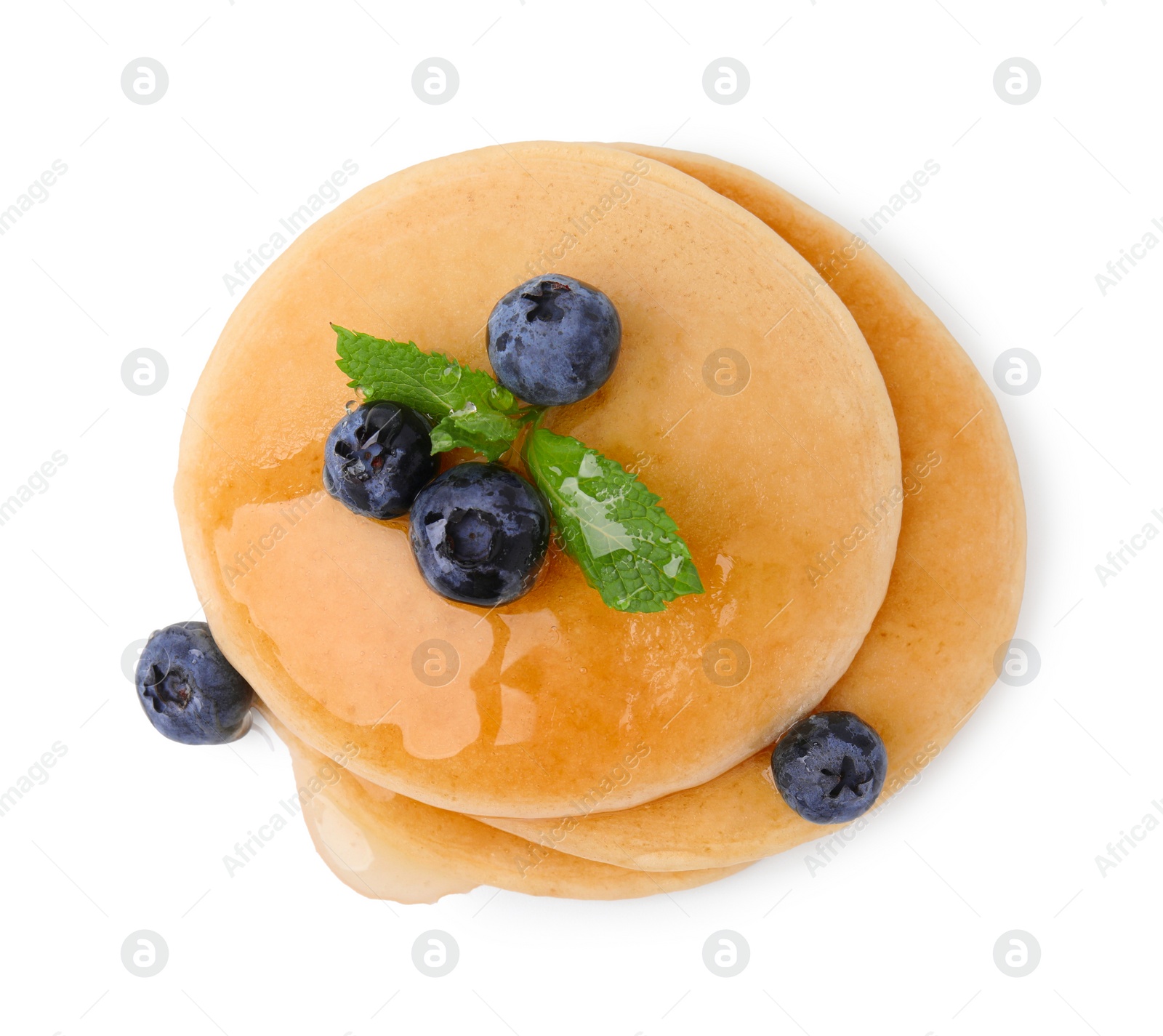 Photo of Tasty pancakes with blueberries and honey isolated on white, top view