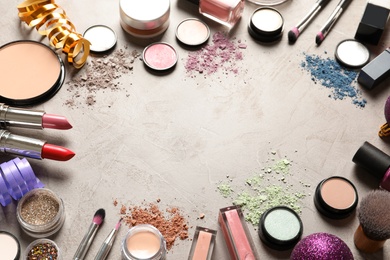 Photo of Composition with makeup products and Christmas decor on table. Space for text