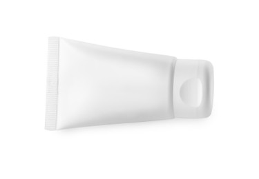 Photo of Tube of hand cream isolated on white, top view