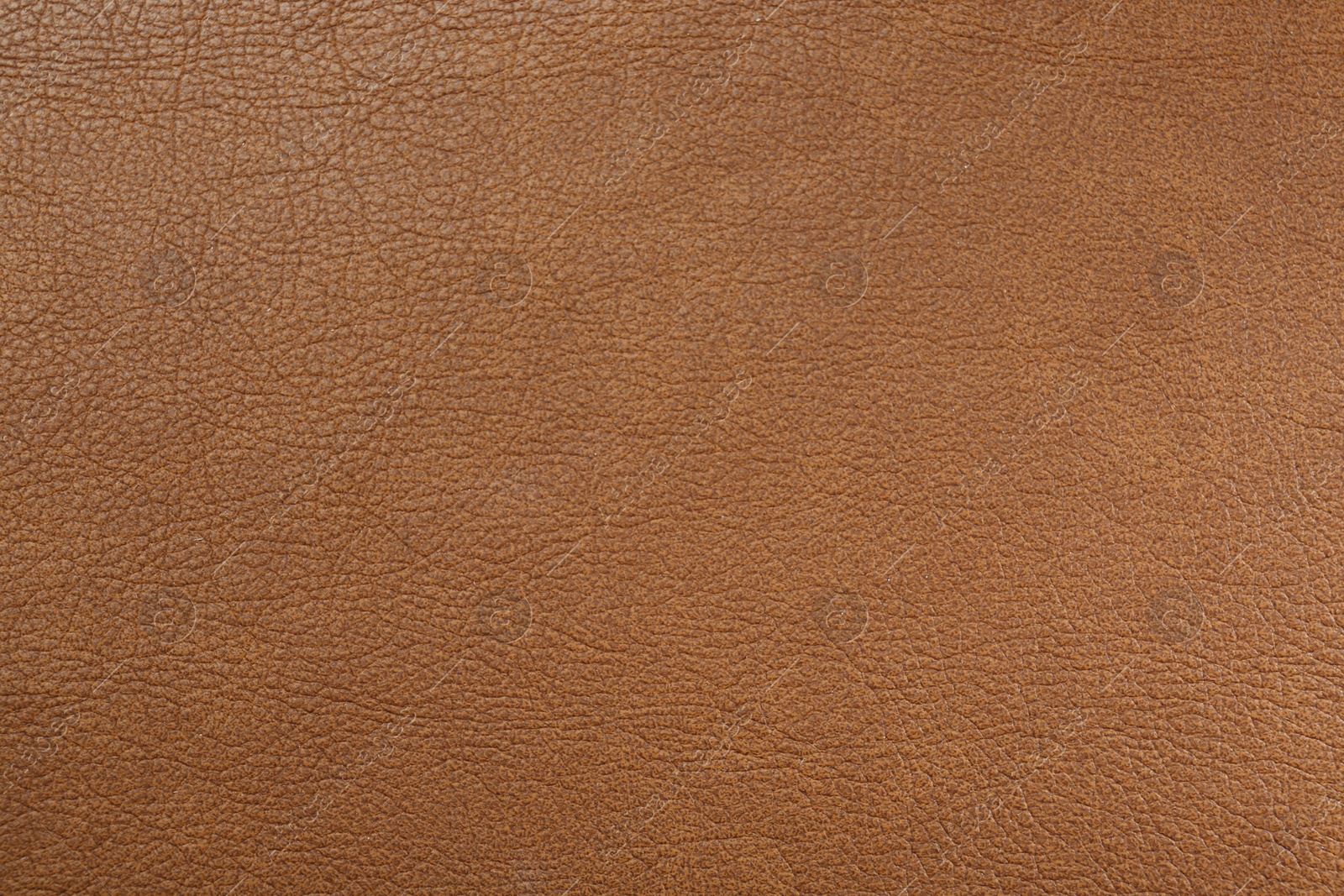 Photo of Light brown leather as background, top view