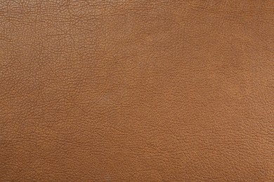 Photo of Light brown leather as background, top view