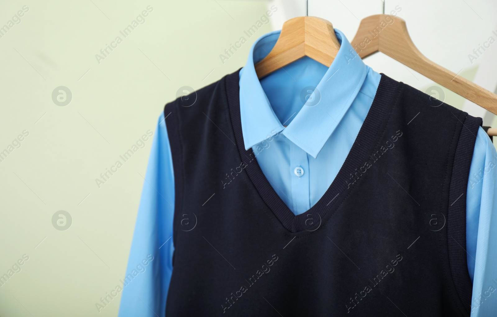 Photo of School uniform for boy on hanger, closeup