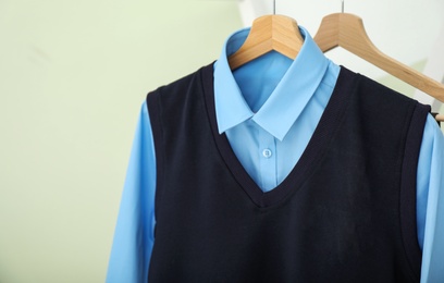 Photo of School uniform for boy on hanger, closeup