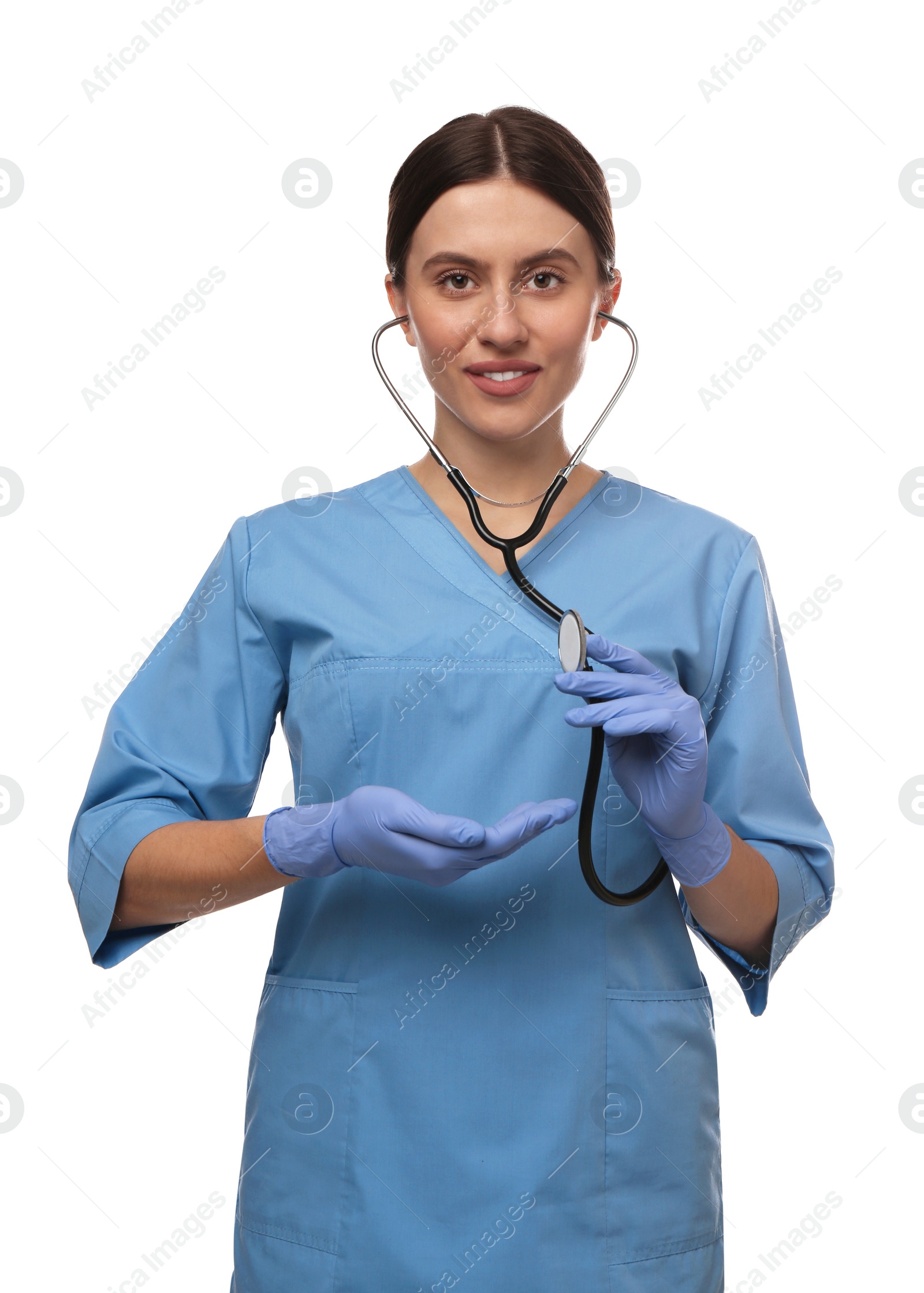 Photo of Doctor with stethoscope holding something on white background. Cardiology concept