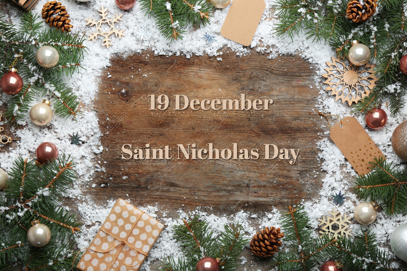 Image of 19 December Saint Nicholas Day. Christmas decorations on wooden background, flat lay