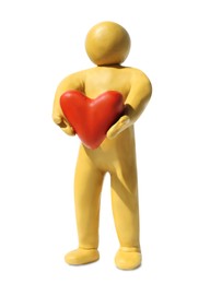 Yellow plasticine human figure with pink heart isolated on white